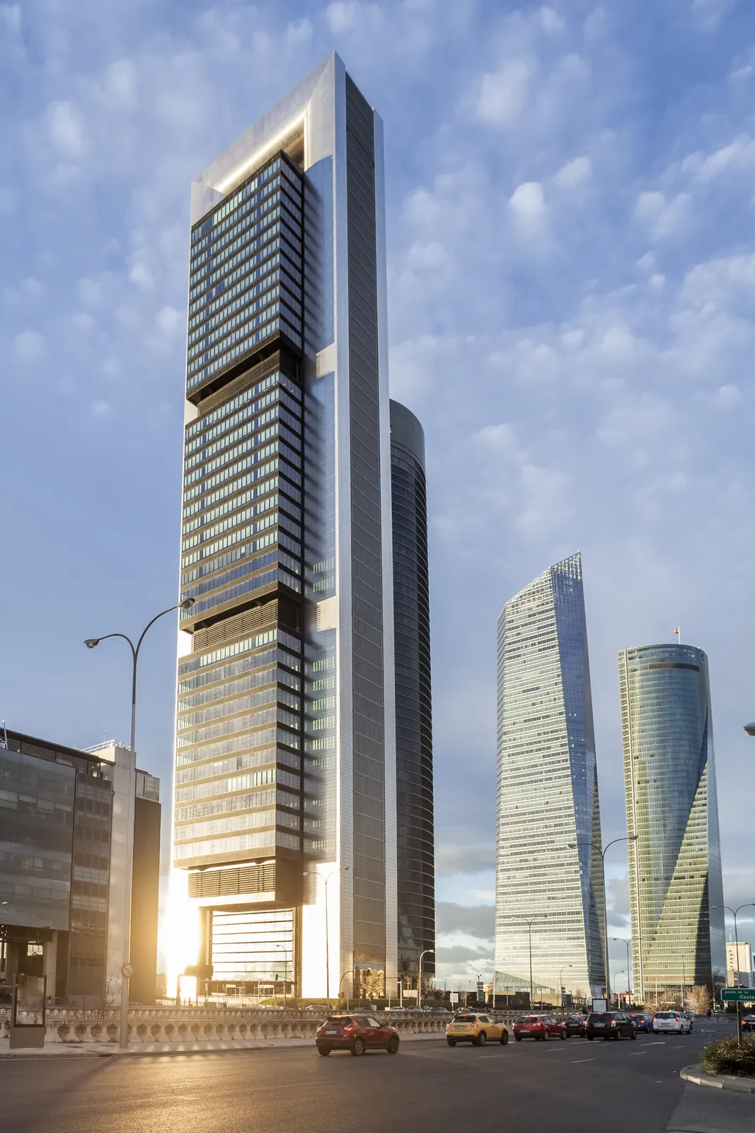 Vertical Blue Sky Cloudy Building Landscape Free Stock Photo